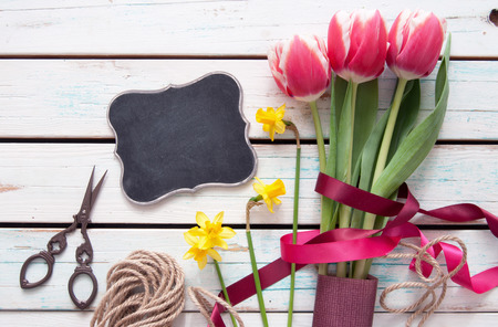 Spring tulip bouquet with small blackboard signの写真素材
