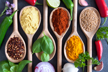 Fresh seasoning cooking ingredients including herbs and spicesの写真素材