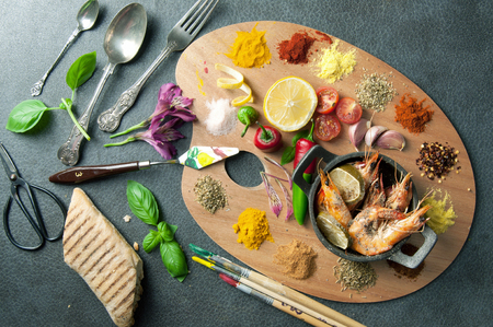 Food palette with fresh ingredients including herbs and spicesの写真素材