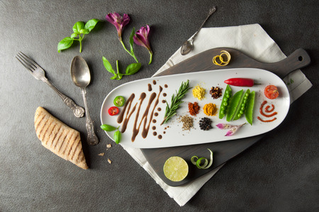 Fresh cooking ingredients including herb and spicesの写真素材