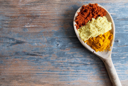 Wooden spoon with mix of spicesの写真素材