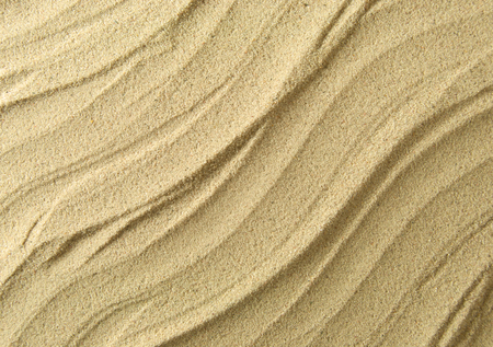 Close up of textured ridges in the sandの写真素材