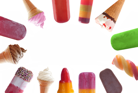 Assorted icecream and frozen lollies over a white background with spaceの写真素材
