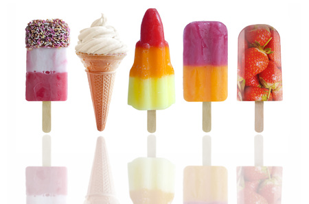 Five assorted icecream and frozen lollies over a white backgroundの写真素材