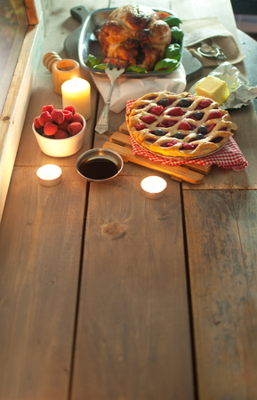 Xmas food spread on a wooden table with space の写真素材