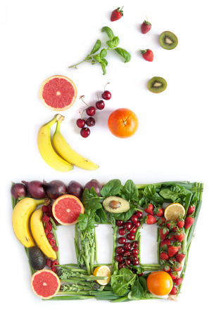 Grocery basket made of food over a white backgroundの写真素材