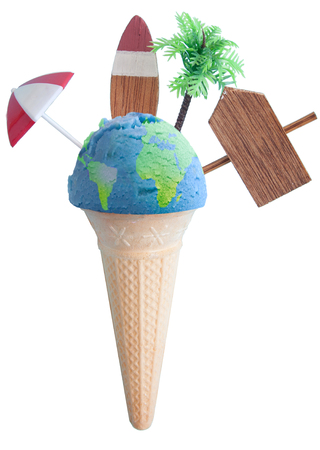 Ice cream cone with atlas map and vacation items including vacation painted on beach post, parasol and palm treeの写真素材