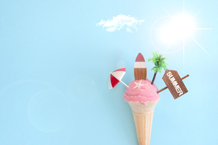 Strawberry icecream with beach items and sunshineの写真素材