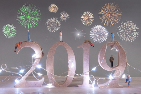 Miniatures climbing 2019 wooden blocks with firework displayの写真素材