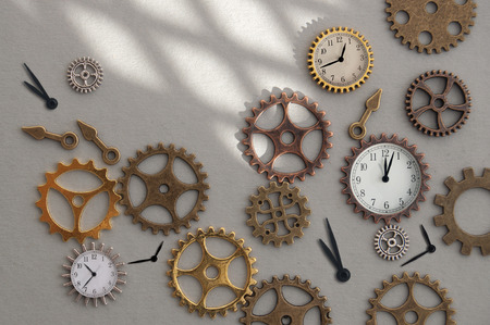 Clock parts including hands gears and cogs の写真素材