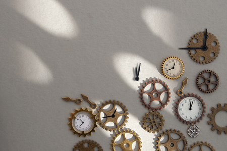 Clock parts including hands gears and cogs with spaceの写真素材