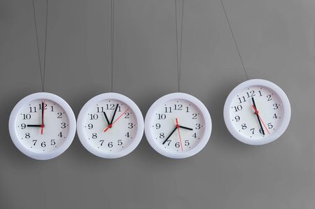 Clocks colliding into each other 