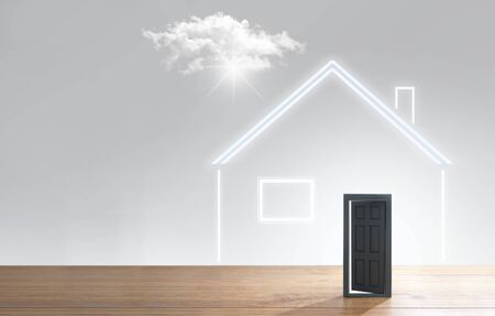 Open door with glow of light and roof house symbolの写真素材