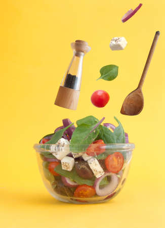 Greek salad with feta cheese, kalamata olives and tomatoesの写真素材