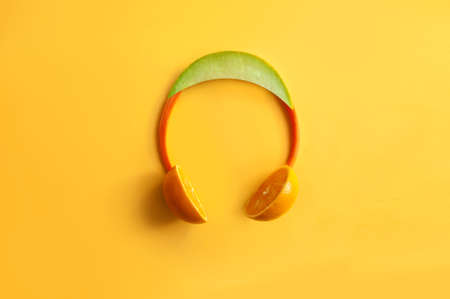 Summer headphone set,  made of fruits and vegetable including melon, carrots and orangesの写真素材