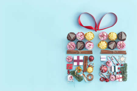 Collection of food confectionery and christmas decorations in the shape of a gift box icon with red ribbon bowの写真素材