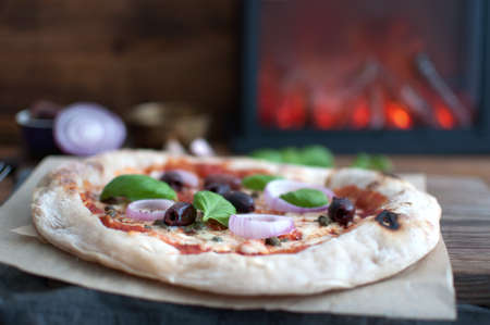 Traditional italian sourdough pizza with tomato and mozzarellaの写真素材