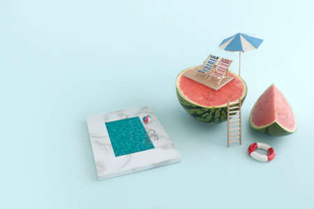Summer vacation concept; deck chairs and beach parasol on top of a watermelon, with swimming pool down belowの写真素材