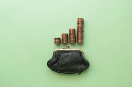 Rising costs stacked coins gradually increasingの写真素材