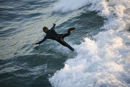 A surfer wipes out on a gnarly wave.の写真素材