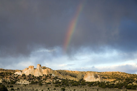 Rainbow over a southwest desertの写真素材
