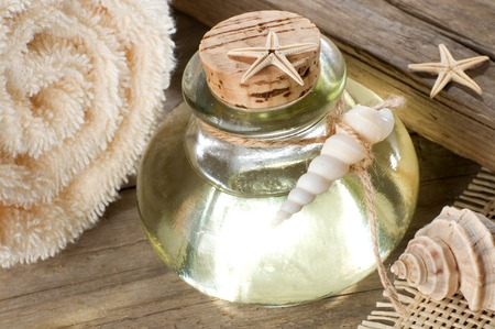 Spa still life with essential oil, towel and starfishesの写真素材