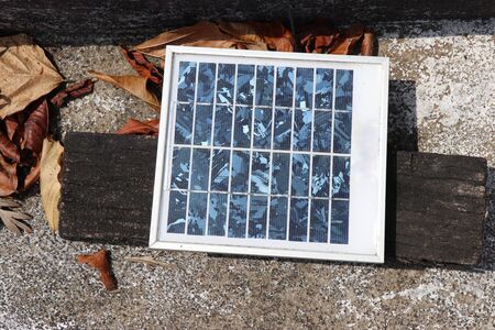 Solar Panel with sunlight falling on it used in charging small home light appliances