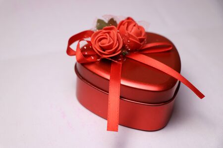 Box in the shape of heart used for presenting gifts to loved onesの写真素材