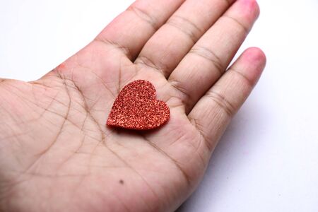 Red Heart which is symbol of love made of glitter used in decorations for some special eventsの写真素材