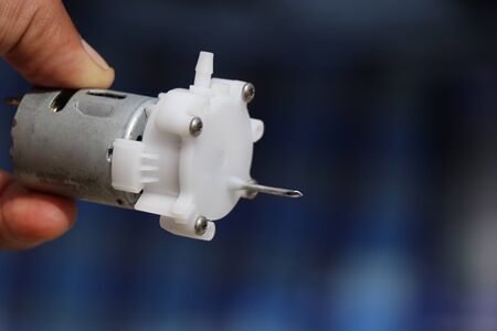 DC Motor with pump attached to it for water pumping used in electronic hobby projectsの写真素材