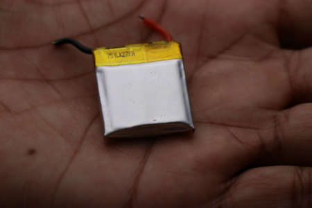 Lithium Polymer battery which is rechargeable type battery used in most of the mini electronic projects held in handの写真素材