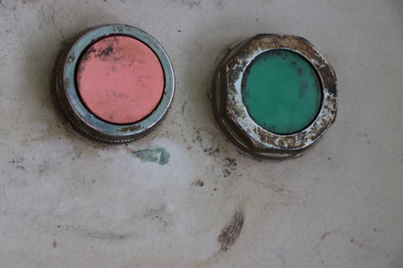 Submersible water pump control board buttons used for starting and stopping motor