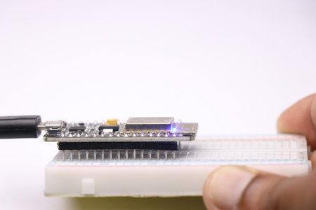 Open source development board used in making IOT prototype projects connected to breadboard