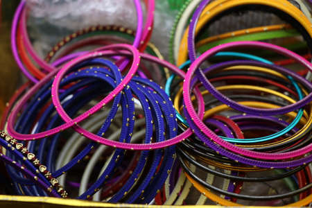 Colorful bangles in a box. Bangles are traditional jewelry for indian woman which is kind of...