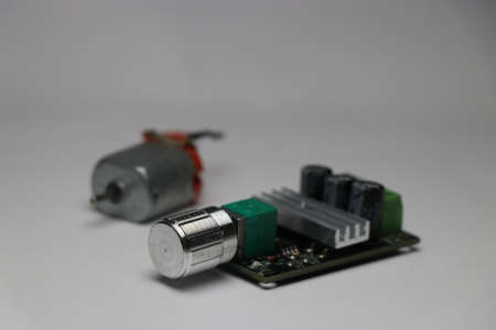 DC Motor pwm speed controller with dc motor on background