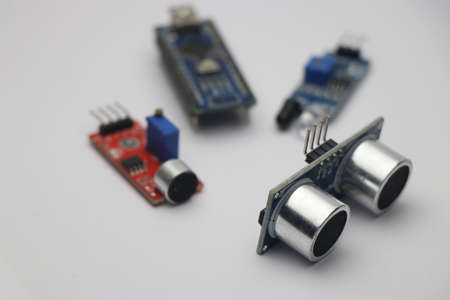 Ultrasonic sensor with its other alternatives and micro controller on background