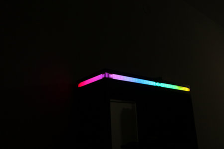 LED strip light diffused with paper that is displaying gradient colors on a house object. LED light...