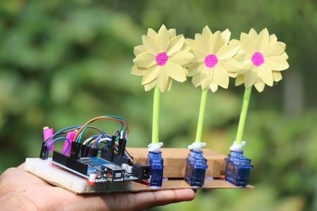 Programmable microcontroller projects. Electronic circuit on a small breadboard connecting micro...