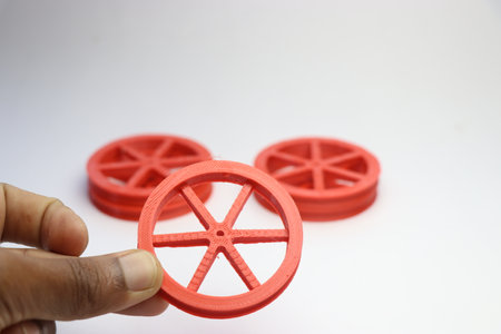 Wheels for making various hobby robotic projects held in the hand