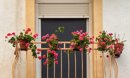 Balcony with flowers. Spain streetの写真素材