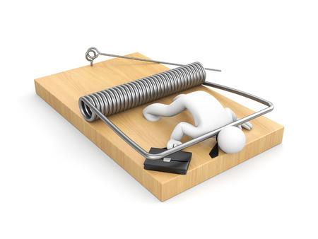 Businessman on mousetrap - business metaphorの写真素材