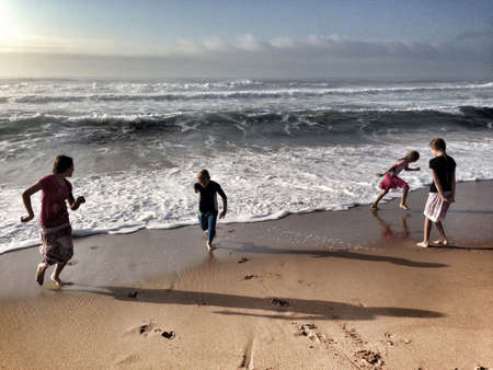 Kids playing on the beach