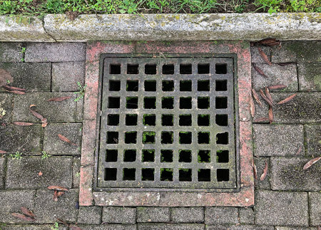Drainage hatch in the garden, closeup of photo.の写真素材