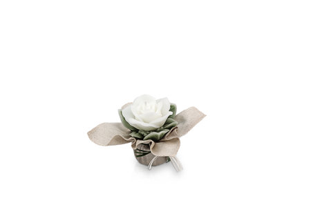 Beautiful artificial flower with ribbon on white background, space for textの写真素材