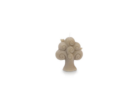 Candle in the shape of a tree on a white background.の写真素材