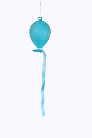 Blue balloon isolated on white background with copy space for your text.の写真素材