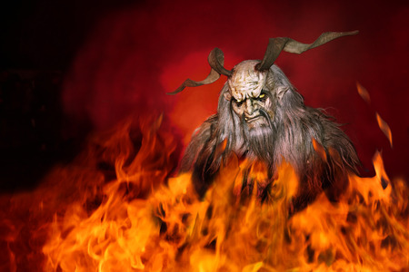 Satan surrounded by fireの写真素材