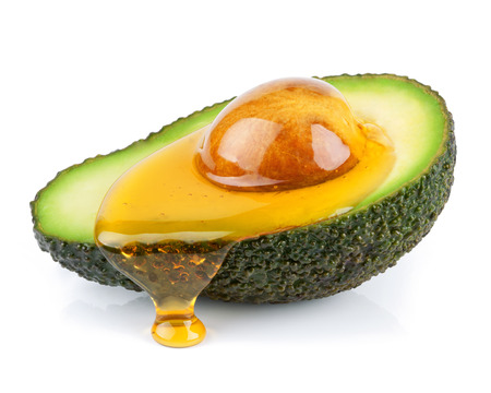isolated avocado with honeyの写真素材