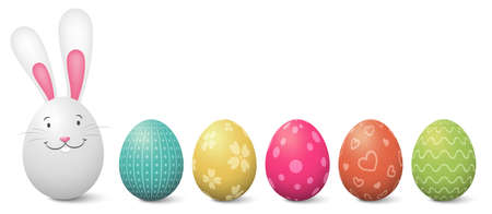 Easter bunny with painted colorful easter eggs illustration isolatedのイラスト素材