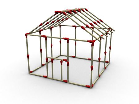 3d rendered image of a house under construction, made up of matches.の写真素材